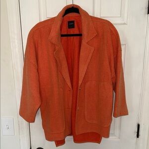 Orange cropped sleeve jacket